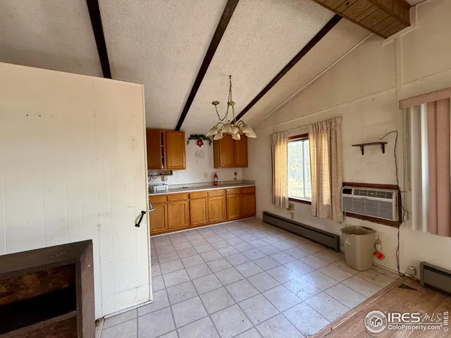 a view of front door with washer and dryer
