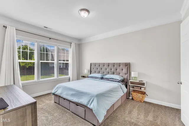 a room with furniture and a flat screen tv