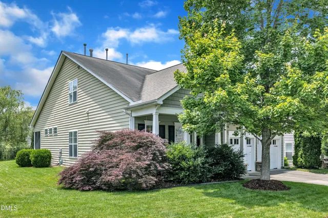 a view of a livingroom from a livingroom with furniture