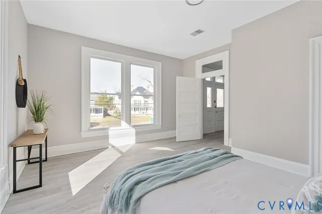 a view of a balcony with wooden fence