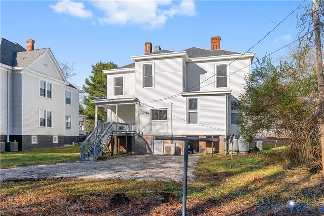 a picture of a bathroom with a shower