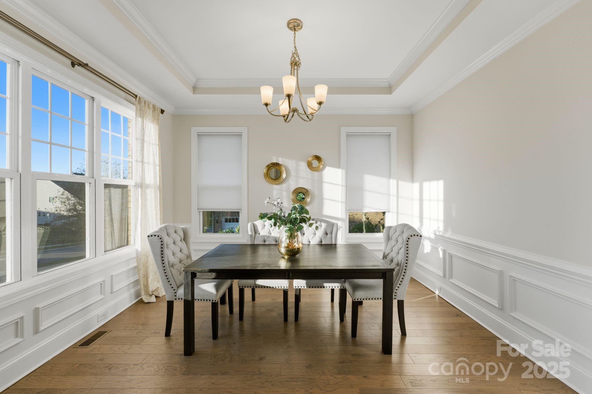 374 Hampton Trail Drive Fort Mill, SC 29708 - Photo 12 of 48 a view of a dining room with furniture window and wooden floor