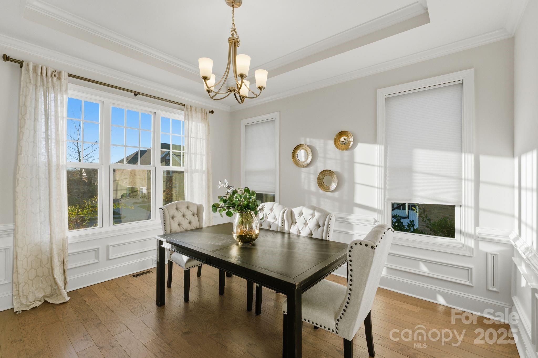 374 Hampton Trail Drive Fort Mill, SC 29708 - Photo 13 of 48 a view of a dining room with furniture window and wooden floor