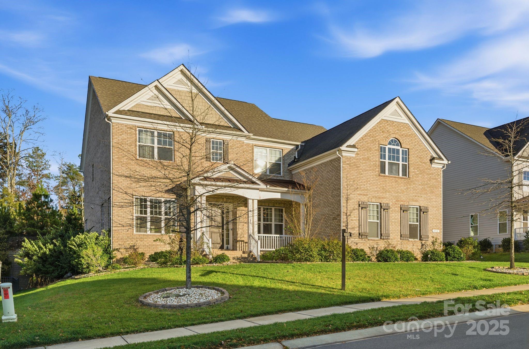 374 Hampton Trail Drive Fort Mill, SC 29708 - Photo 2 of 48 a front view of a house with a yard
