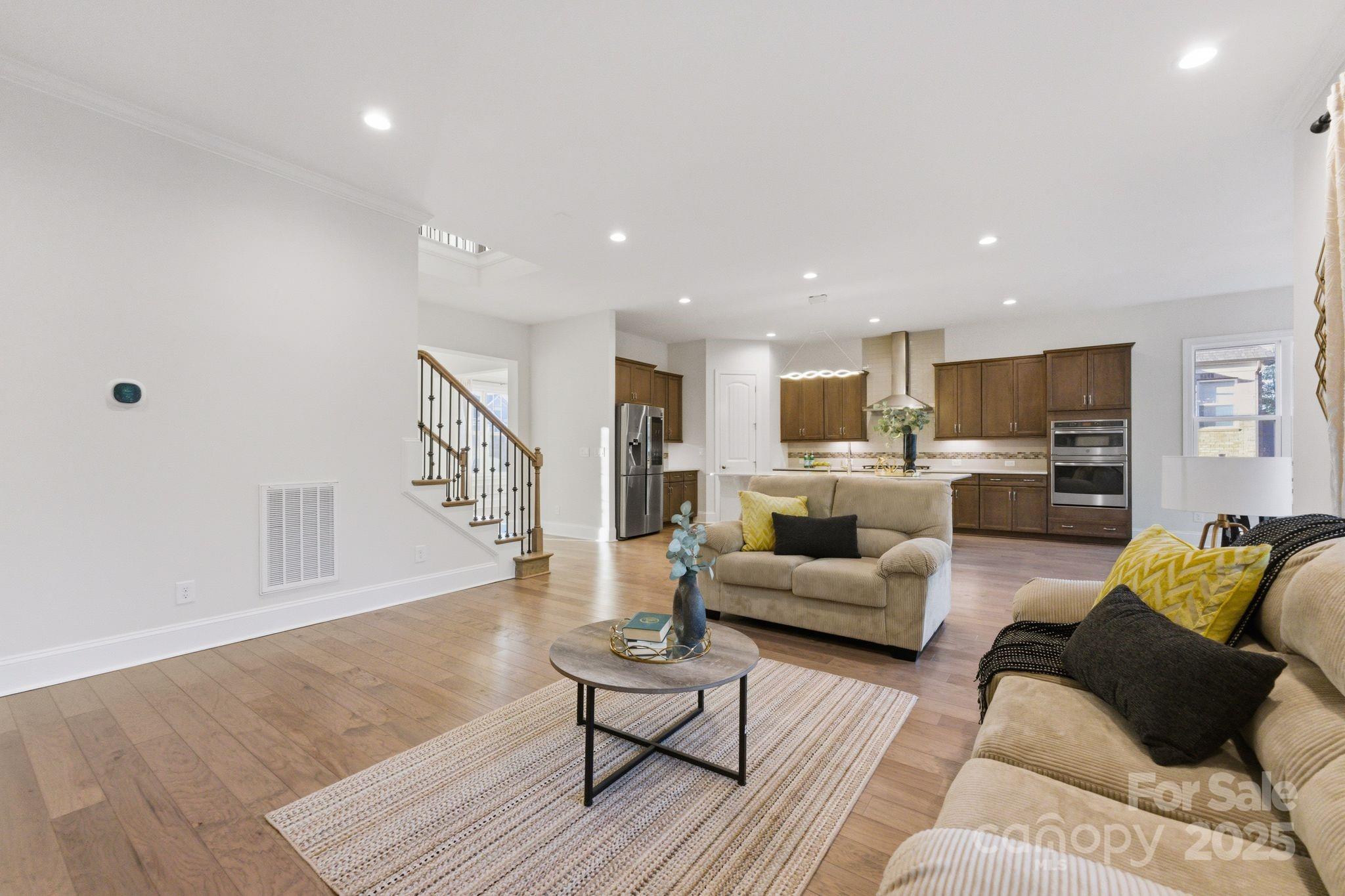 374 Hampton Trail Drive Fort Mill, SC 29708 - Photo 25 of 48 a living room with furniture and wooden floor