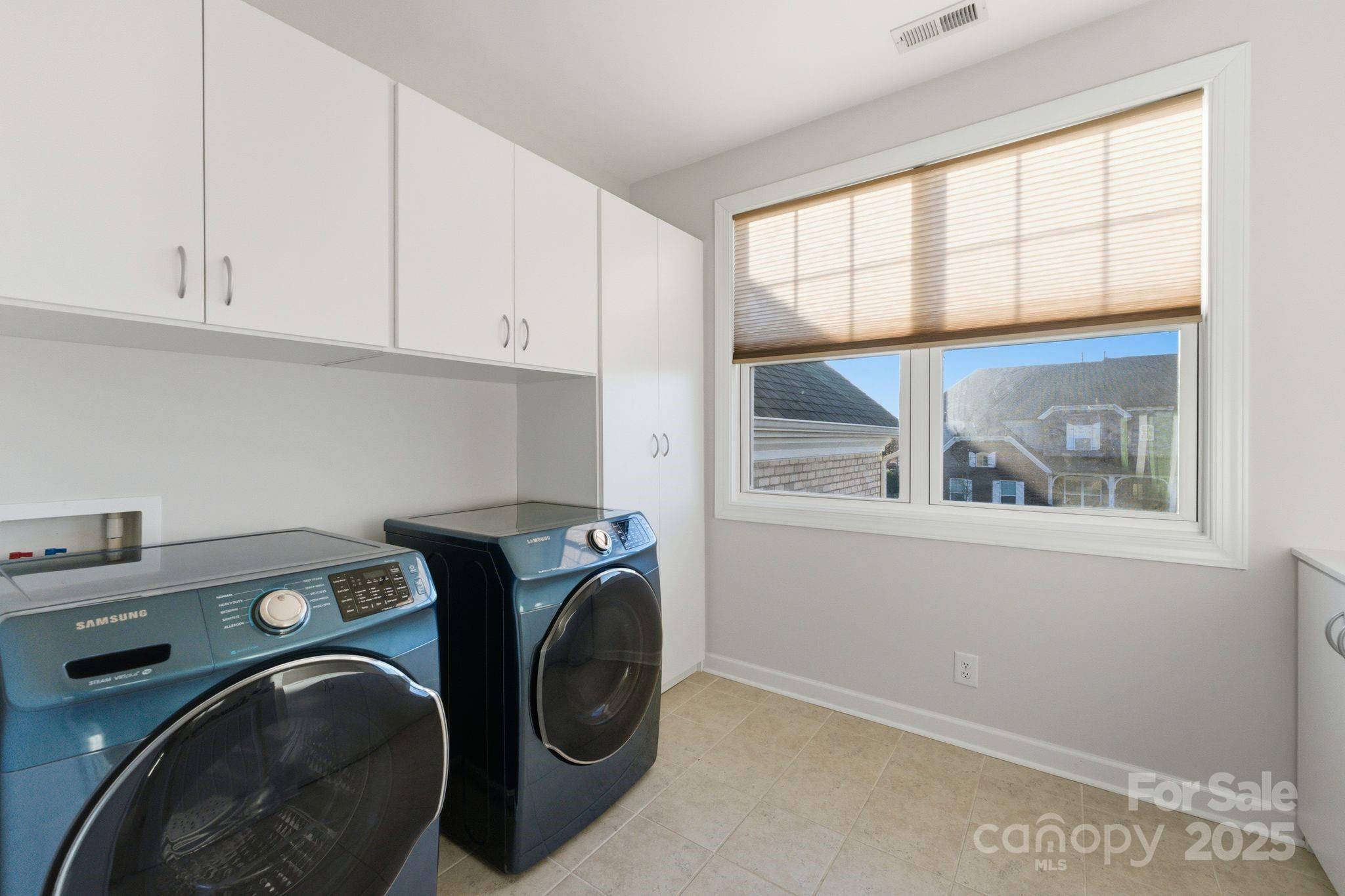 374 Hampton Trail Drive Fort Mill, SC 29708 - Photo 40 of 48 a utility room with dryer washer and a window