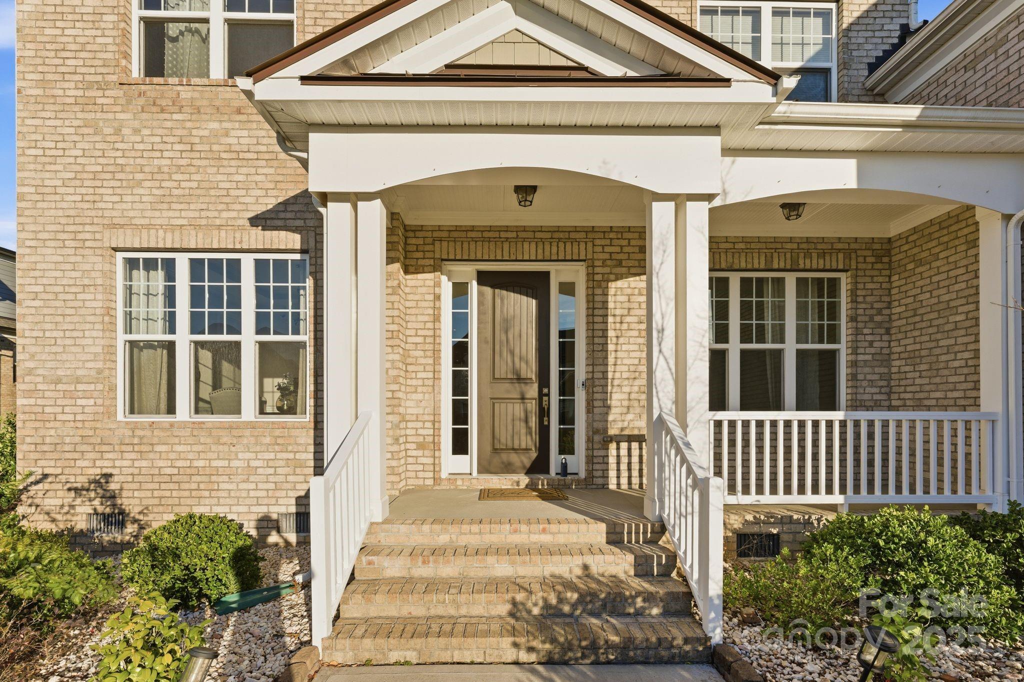 374 Hampton Trail Drive Fort Mill, SC 29708 - Photo 4 of 48 a front view of a house with a porch