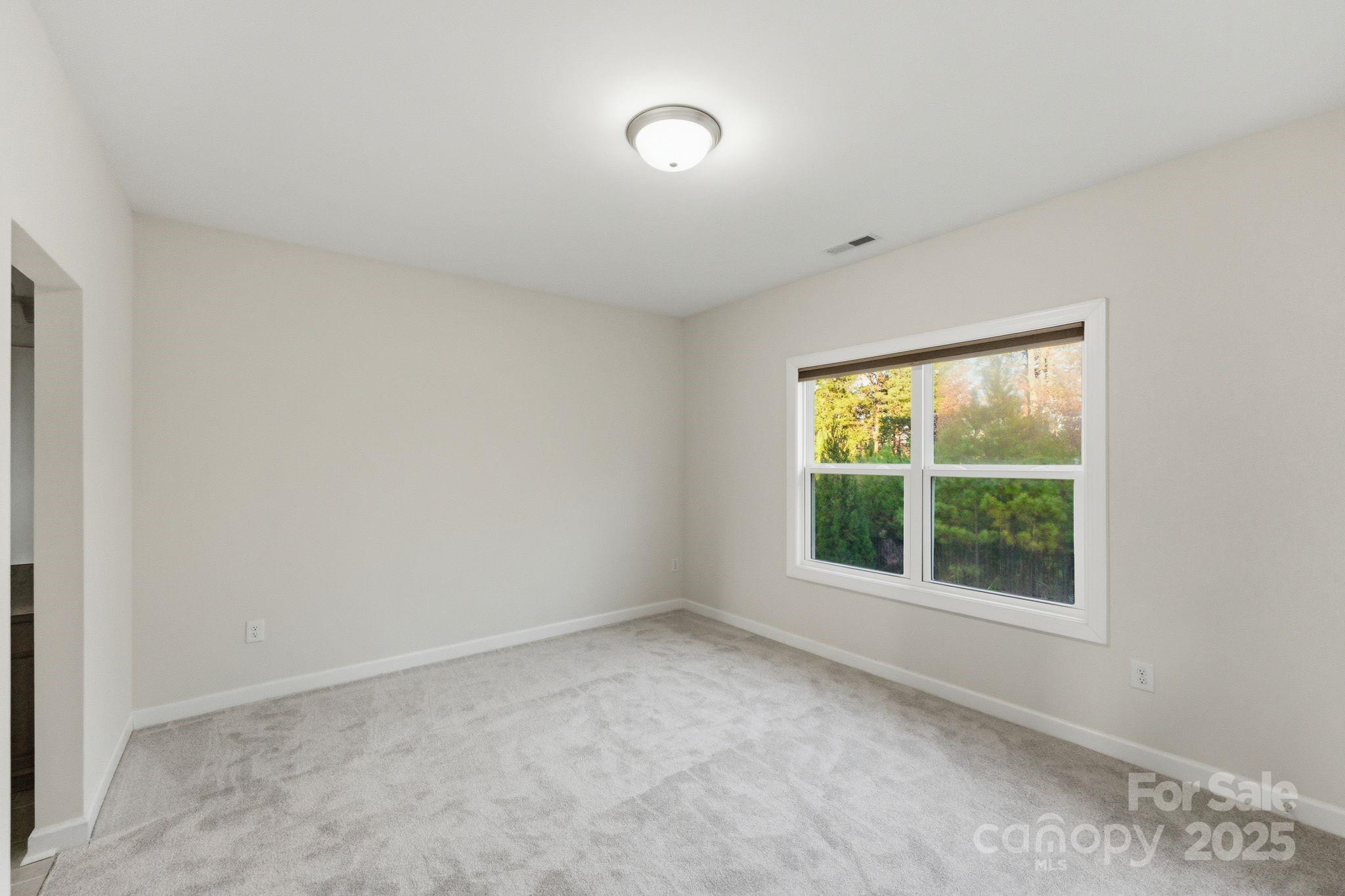 374 Hampton Trail Drive Fort Mill, SC 29708 - Photo 44 of 48 an empty room with a window