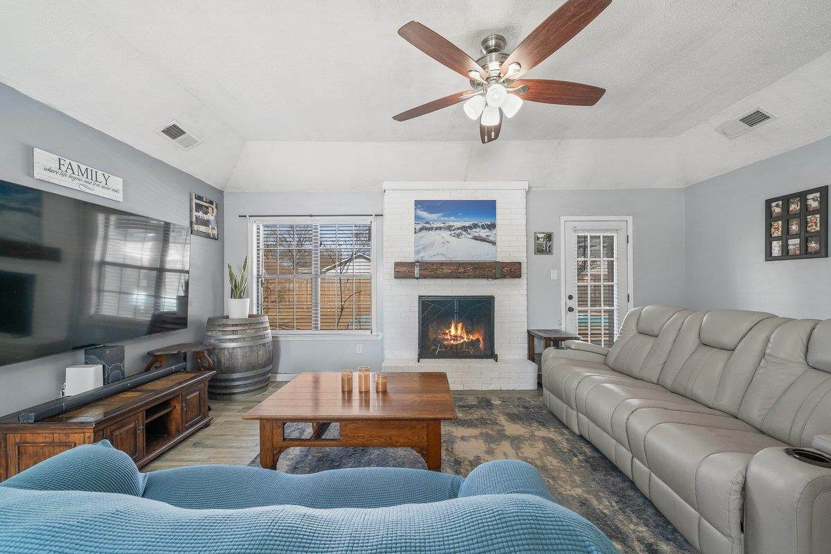 6310 Prairie View Drive Bartlett, TN 38134 - Photo 10 of 27 a living room with furniture and a fireplace