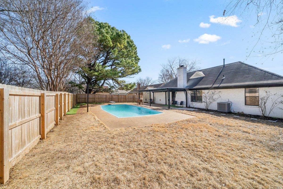 6310 Prairie View Drive Bartlett, TN 38134 - Photo 25 of 27 a view of a house with backyard and tree