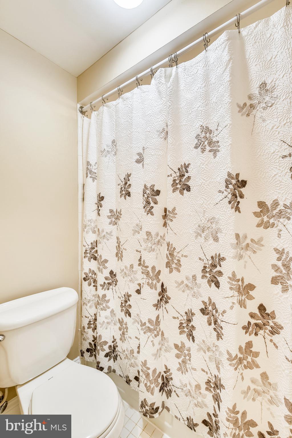 2417 Nees Lane Silver Spring, MD 20905 - Photo 27 of 65 Bath/shower and toilet adjoins sink area