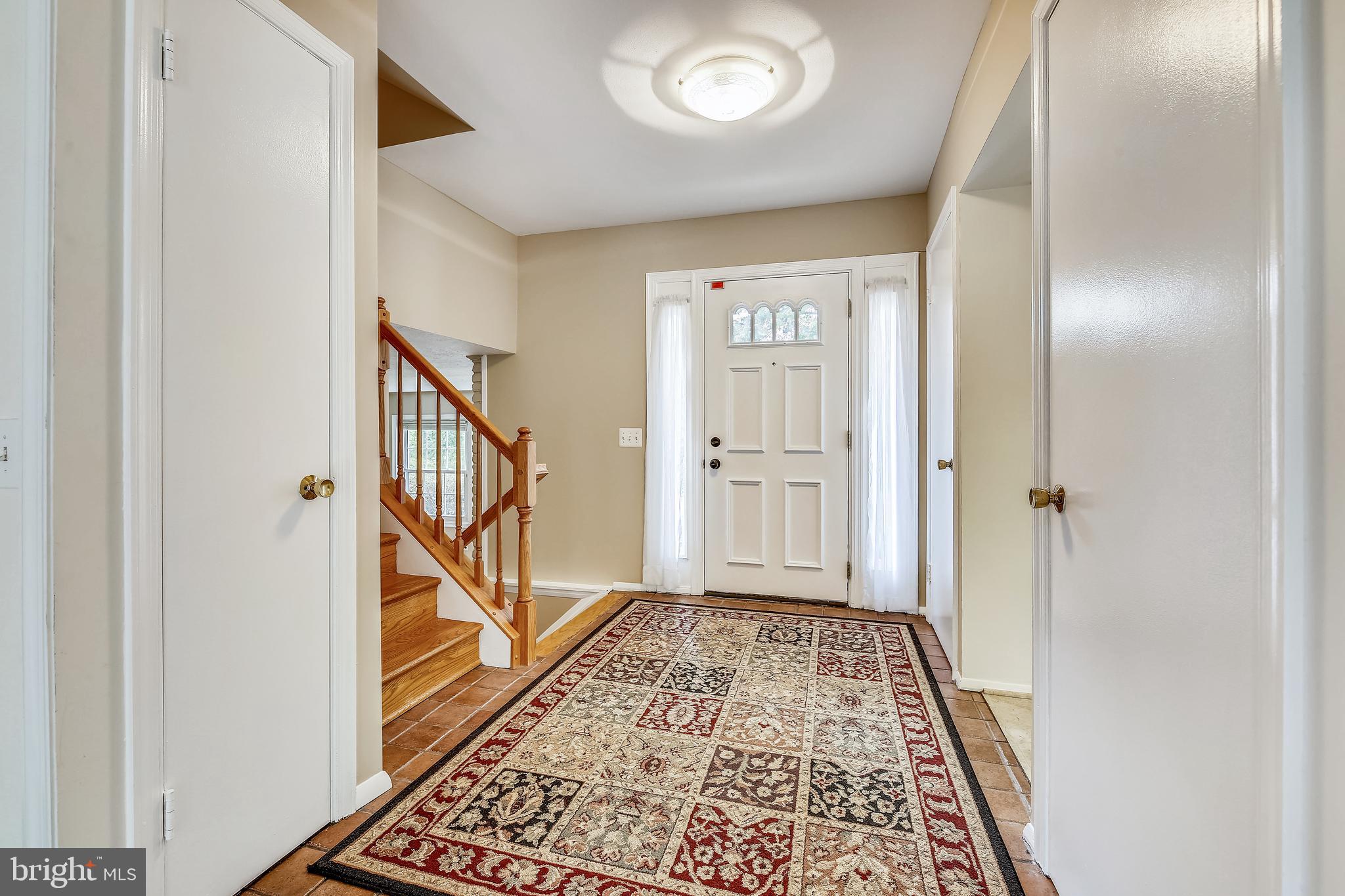 3 closets in entry foyer