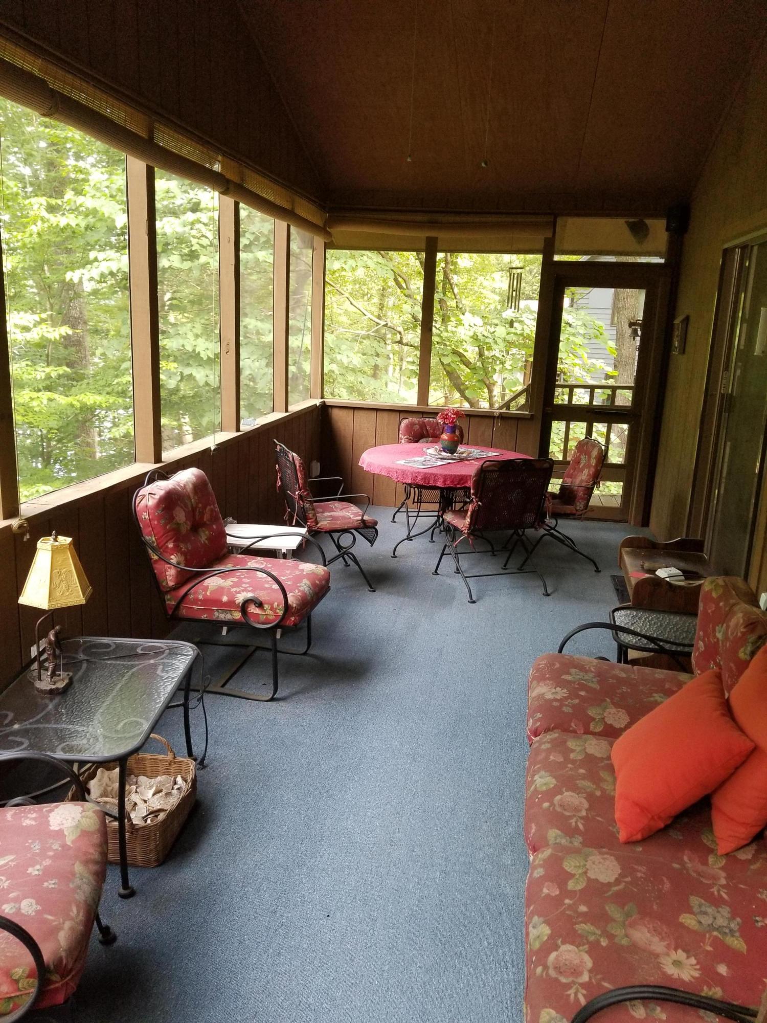 114 Ridgeway Court Moneta, VA 24121 - Photo 16 of 45 Screened in porch off of kitchen