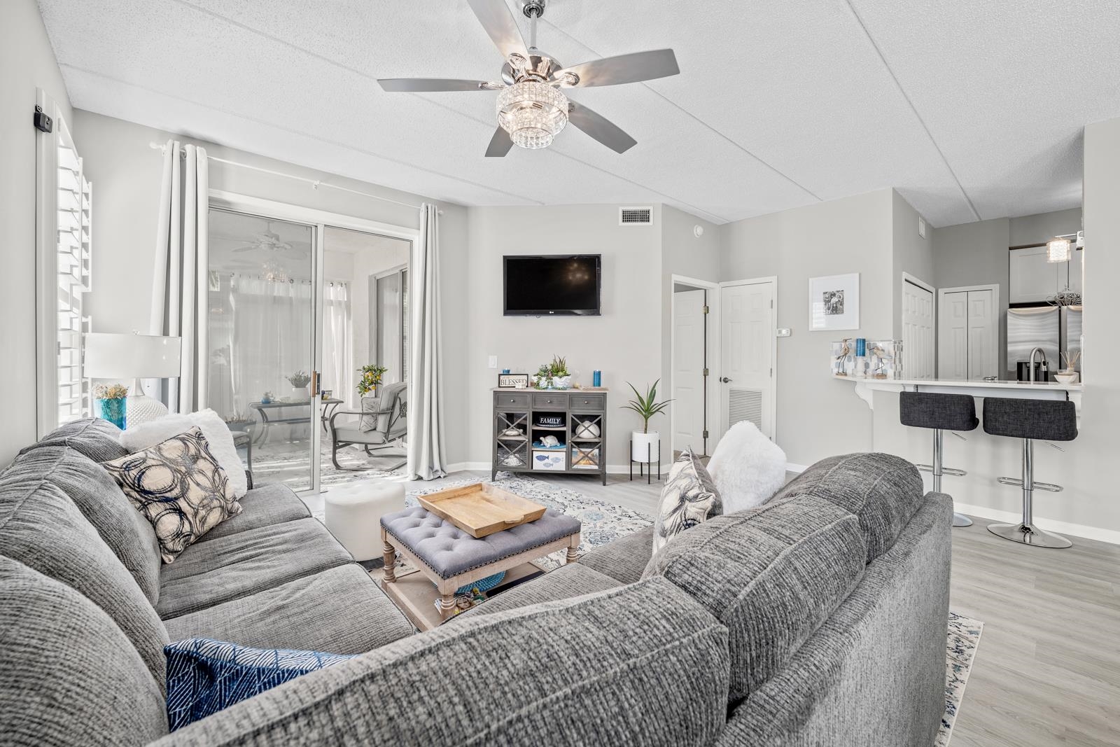 500 Augusta Circle St. Augustine, FL 32086 - Photo 14 of 39 a living room with furniture and a flat screen tv