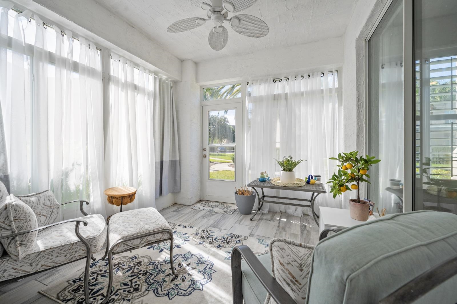500 Augusta Circle St. Augustine, FL 32086 - Photo 15 of 39 a living room with furniture and a large window