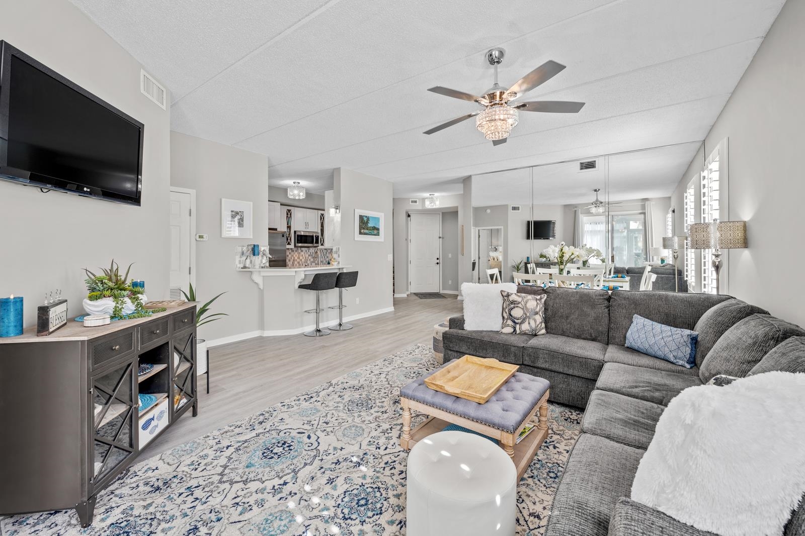 500 Augusta Circle St. Augustine, FL 32086 - Photo 17 of 39 a living room with furniture and a flat screen tv
