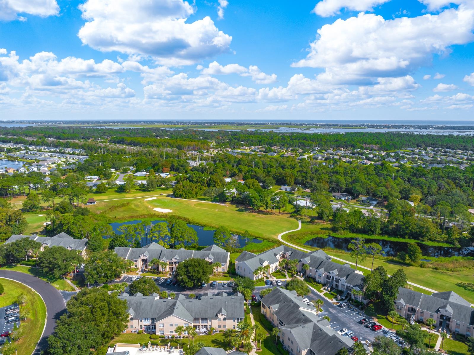 500 Augusta Circle St. Augustine, FL 32086 - Photo 37 of 39 a view of a city with lots of residential buildings ocean and mountain view in back
