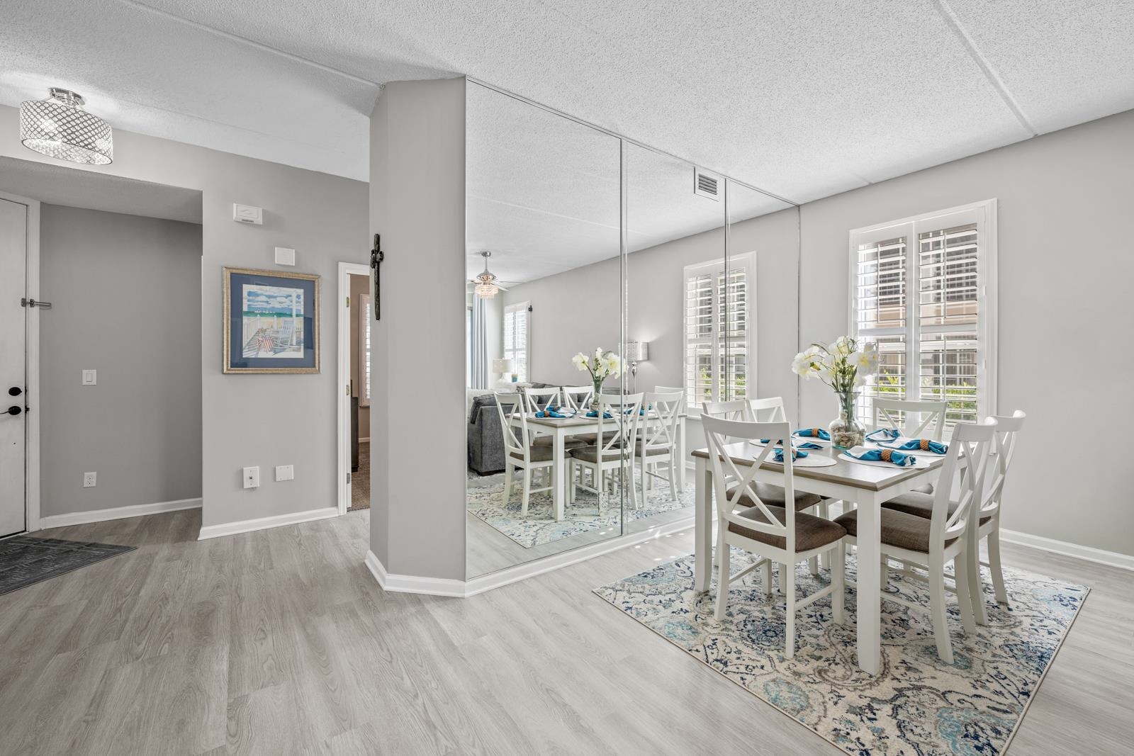 500 Augusta Circle St. Augustine, FL 32086 - Photo 9 of 39 a view of a dining room with furniture and chandelier