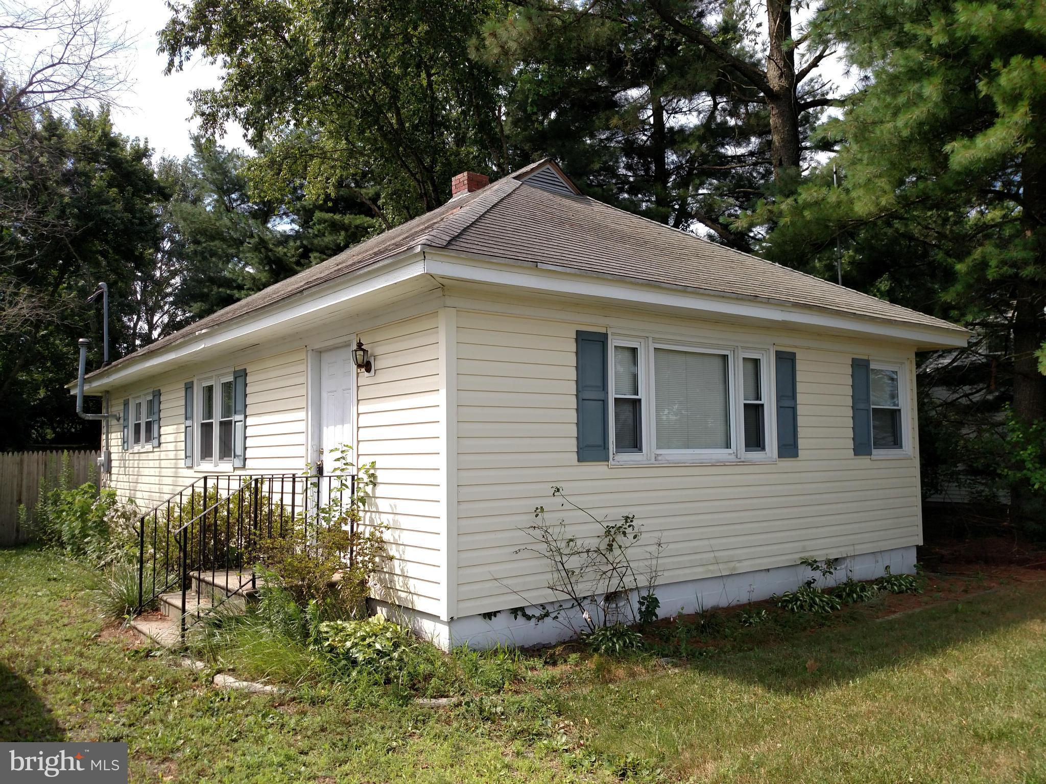6173 Bethlehem Road Preston, MD 21655 - Photo 1 of 8 a view of a house with a yard