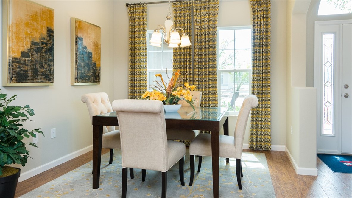 94 52nd Square Vero Beach, FL 32968 - Photo 3 of 20 a view of a dining room with furniture and wooden floor