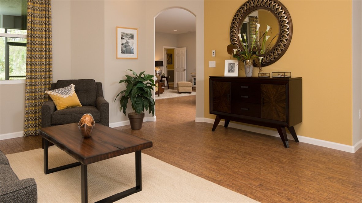 94 52nd Square Vero Beach, FL 32968 - Photo 5 of 20 a living room with furniture and a mirror