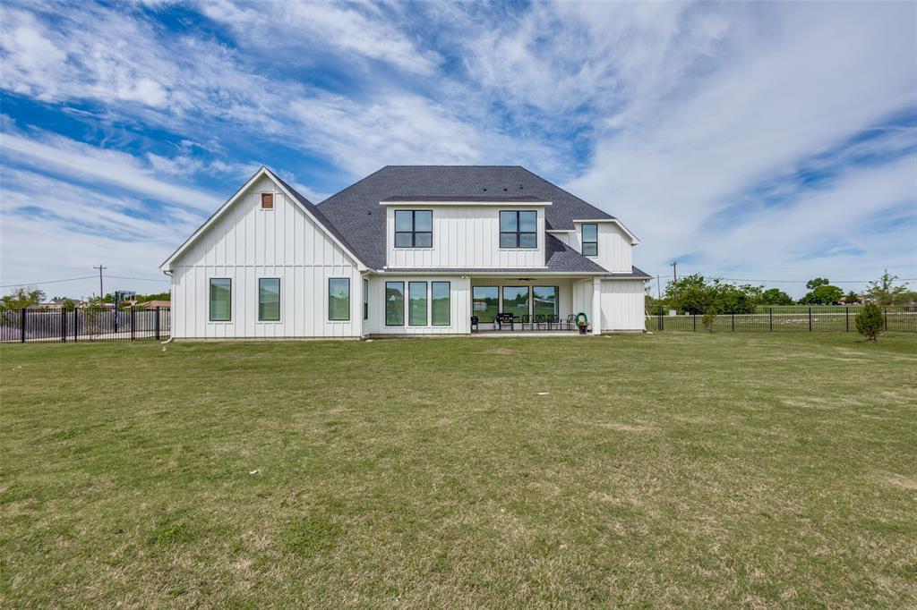 2255 County Road 377 Van Alstyne, TX 75495 - Photo 29 of 35 a front view of a house with a garden