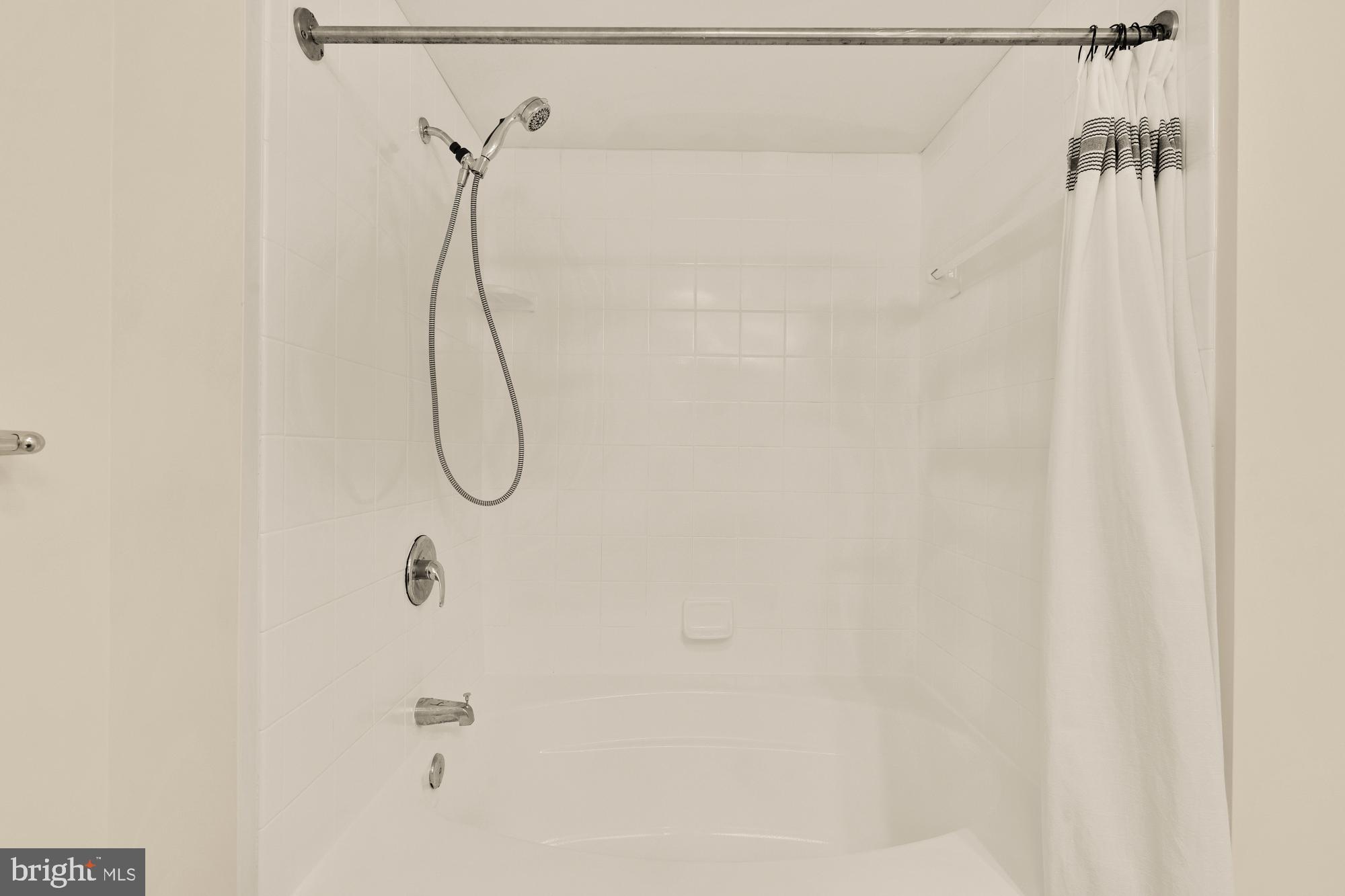 1117 10th Street Northwest, Unit 908 Washington, DC 20001 - Photo 14 of 19 a bathroom with a shower