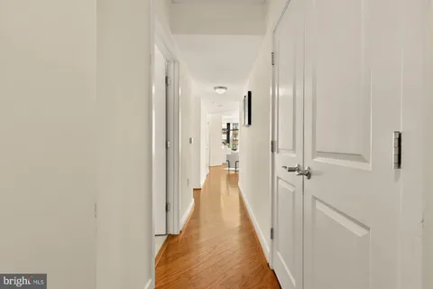 a view of a bathroom from the hallway