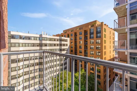 a view of a building from a balcony