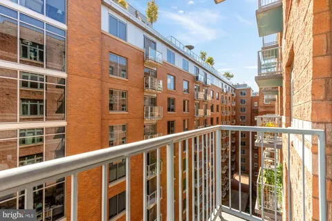 a view of a building from a balcony