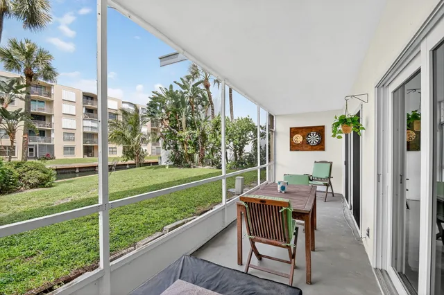 a view of a building with a yard