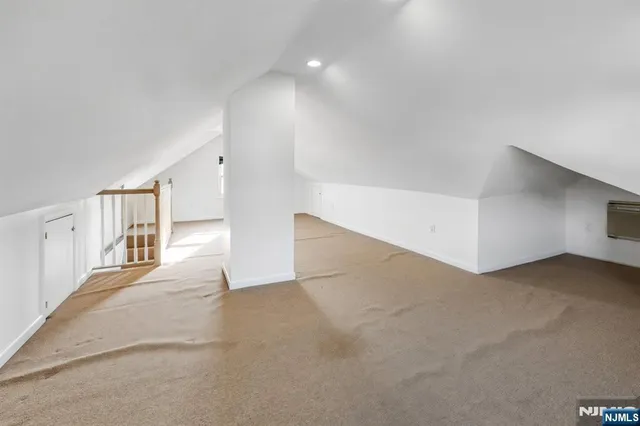 a view of a hallway with staircase