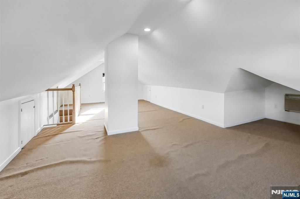 418 Taylor Avenue Hackensack, NJ 07601 - Photo 32 of 48 a view of an empty room with stairs