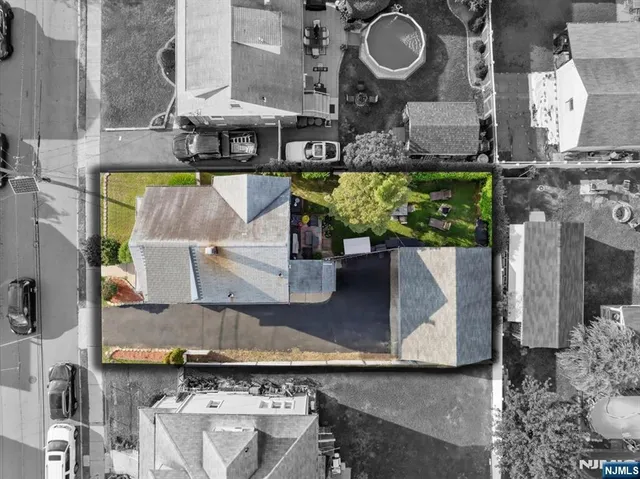 a picture of a bench in front of a wall