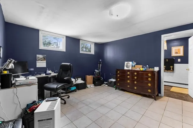 a room with a desk and chair