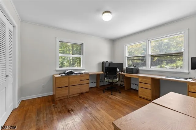a living room with furniture and windows