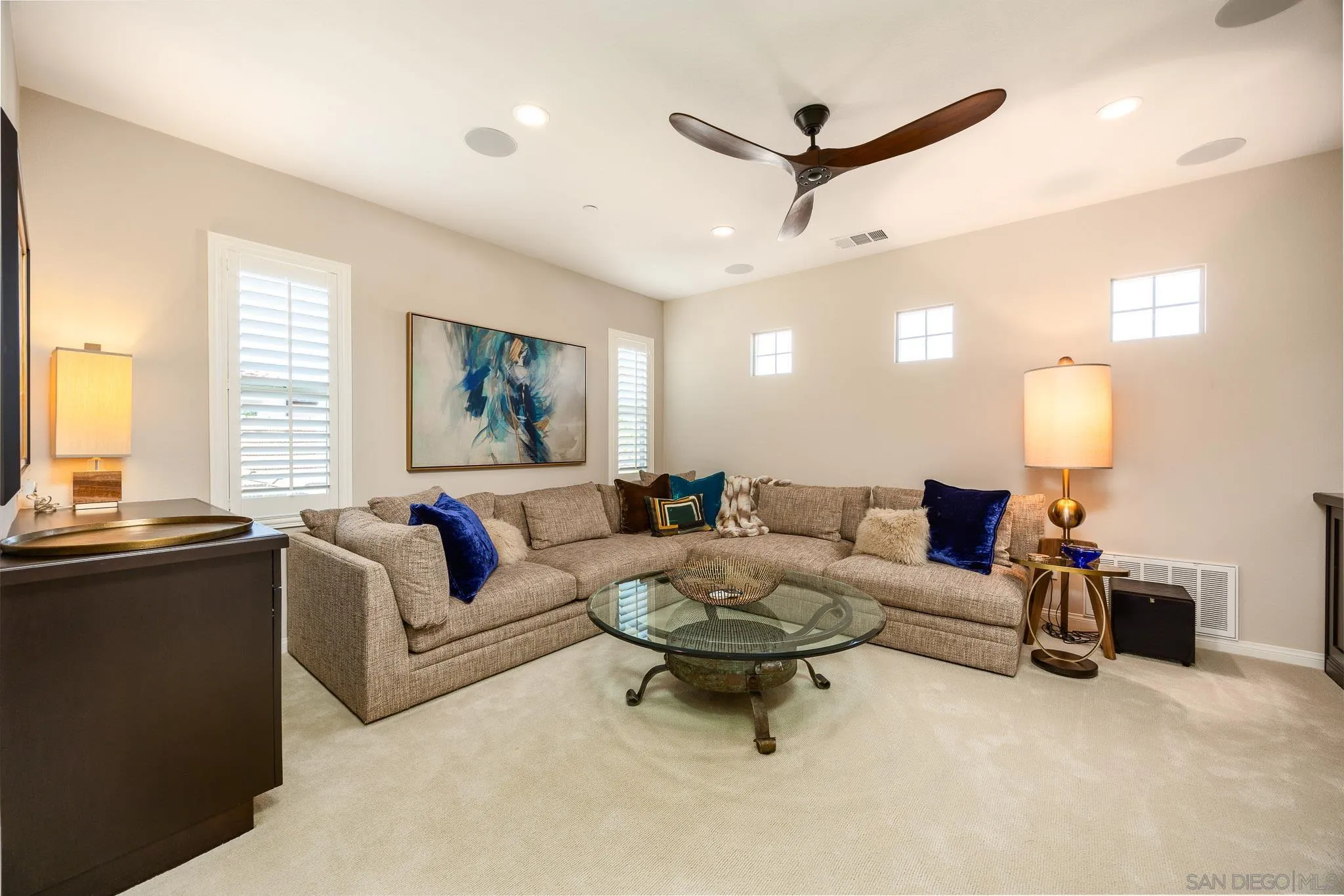 8112 Auberge Circle San Diego, CA 92127 - Photo 19 of 45 a living room with furniture a window and a table