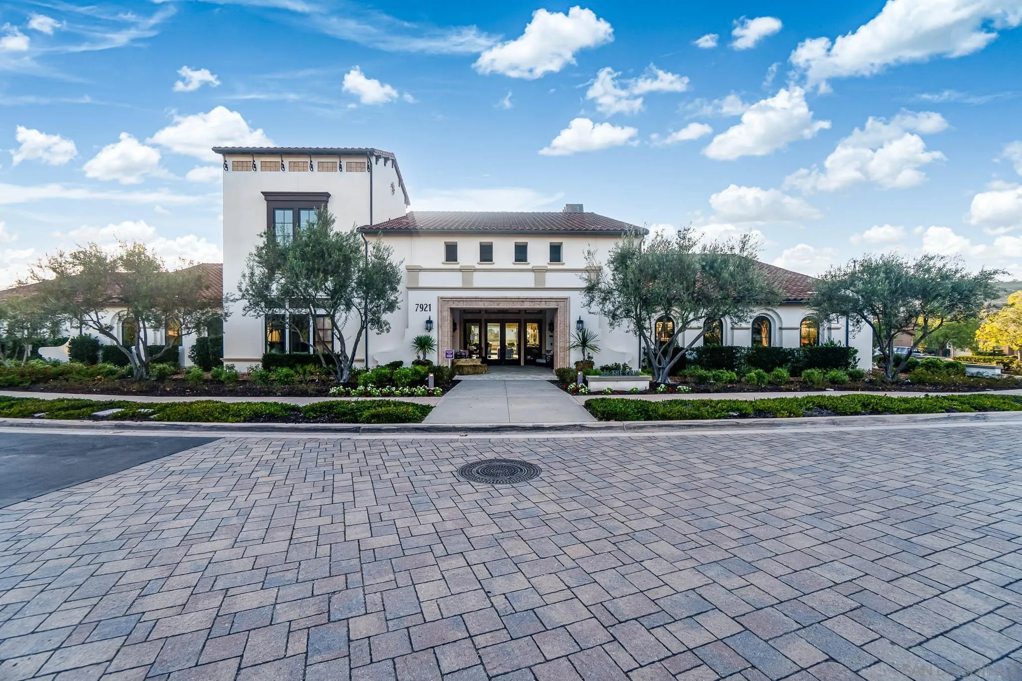 8112 Auberge Circle San Diego, CA 92127 - Photo 27 of 45 a front view of a house with garden
