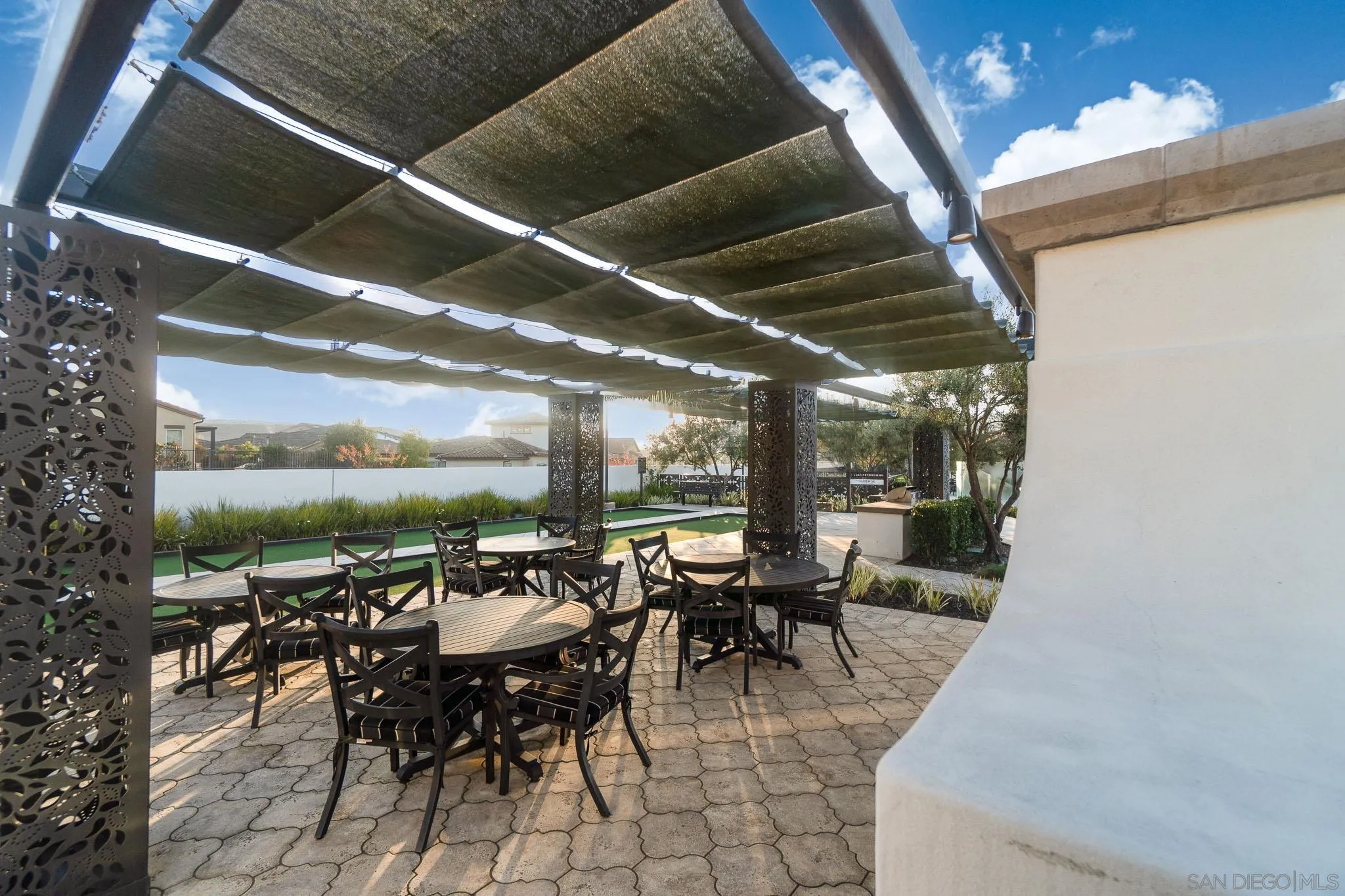 8112 Auberge Circle San Diego, CA 92127 - Photo 35 of 45 a view of a patio with table and chairs