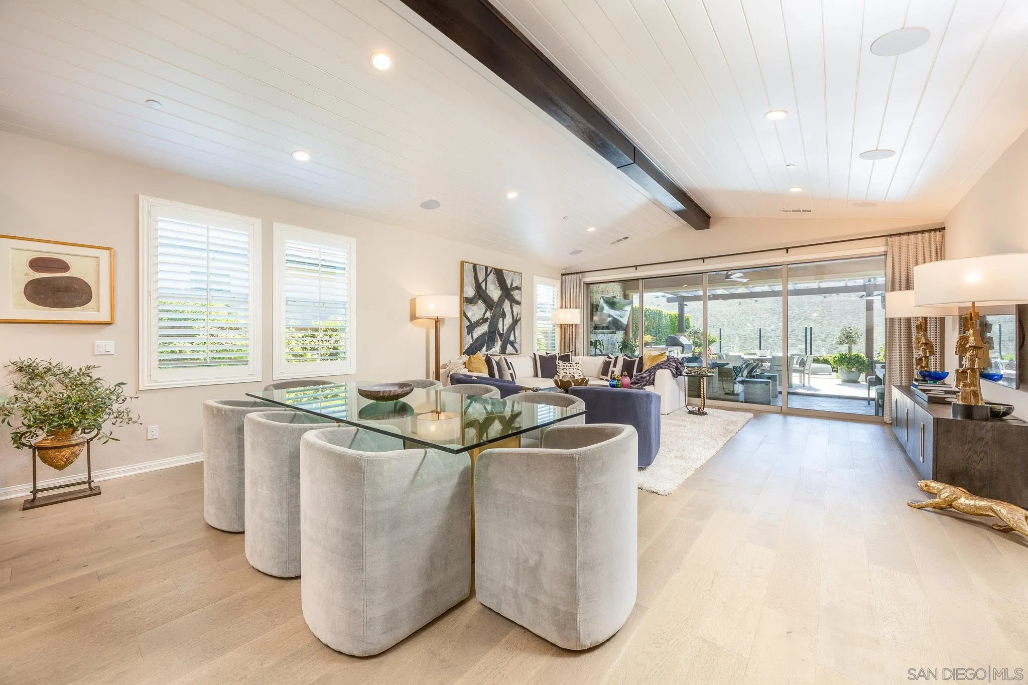 8112 Auberge Circle San Diego, CA 92127 - Photo 5 of 45 a dining room with furniture and a large window