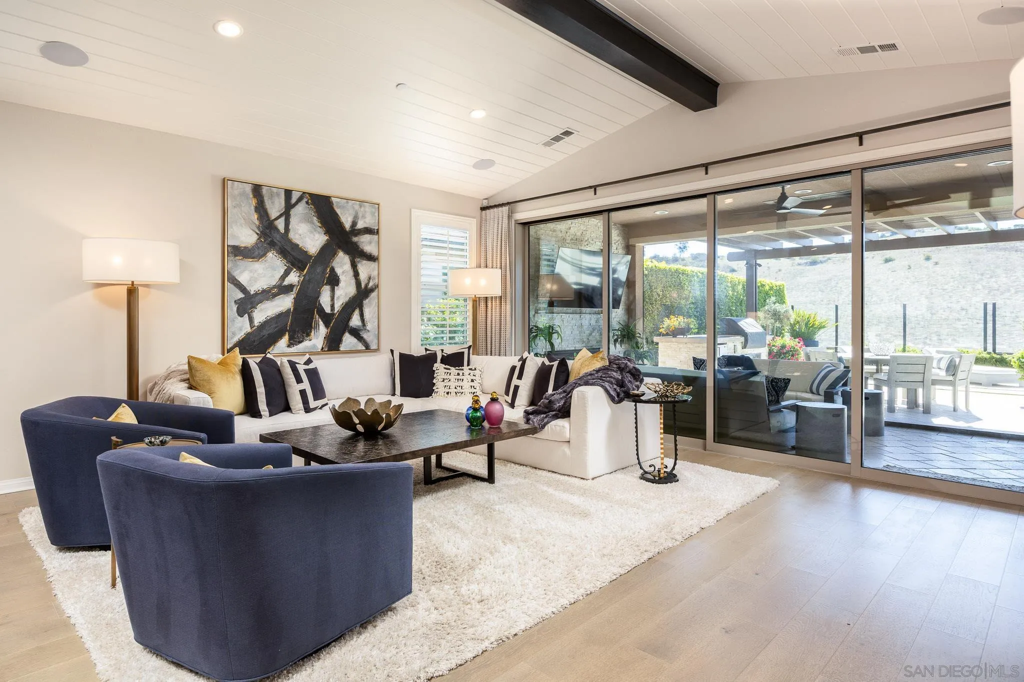 8112 Auberge Circle San Diego, CA 92127 - Photo 6 of 45 a living room with furniture and a large window