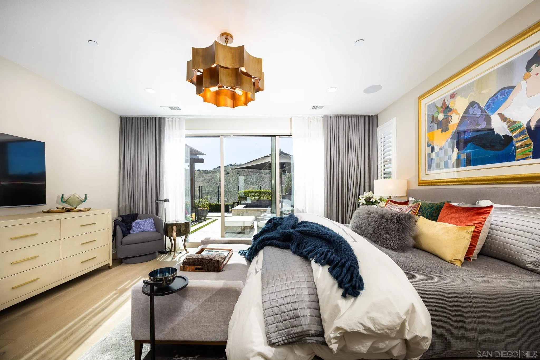 8112 Auberge Circle San Diego, CA 92127 - Photo 10 of 45 a spacious bedroom with a bed and a large window