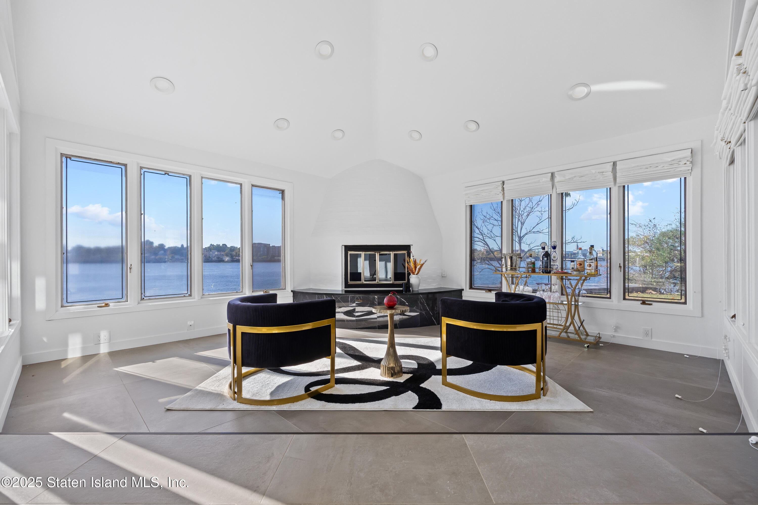 2 Wards Point Avenue Staten Island, NY 10307 - Photo 16 of 38 a living room with furniture and large windows