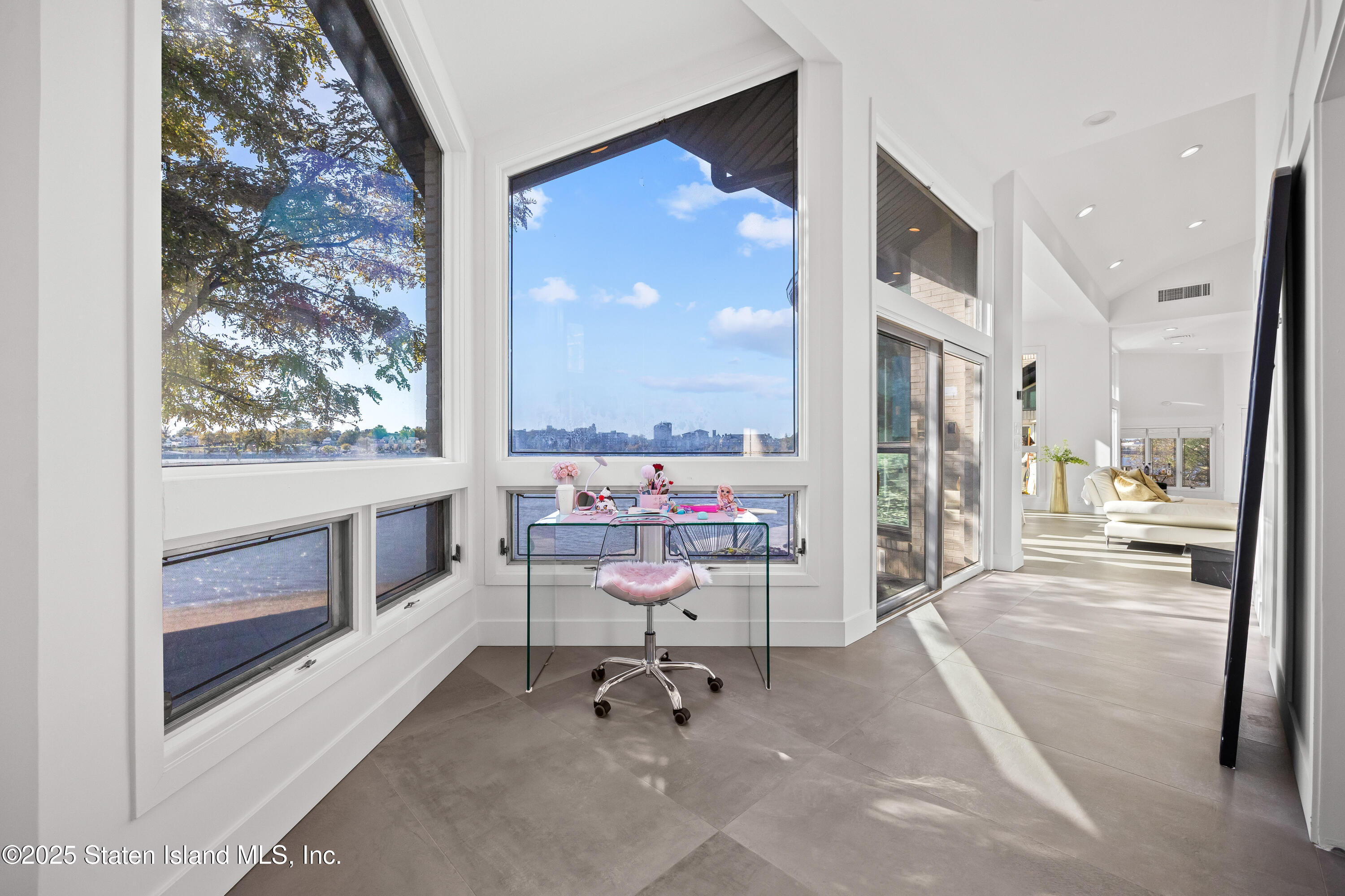 2 Wards Point Avenue Staten Island, NY 10307 - Photo 20 of 38 a living room with furniture and a large window