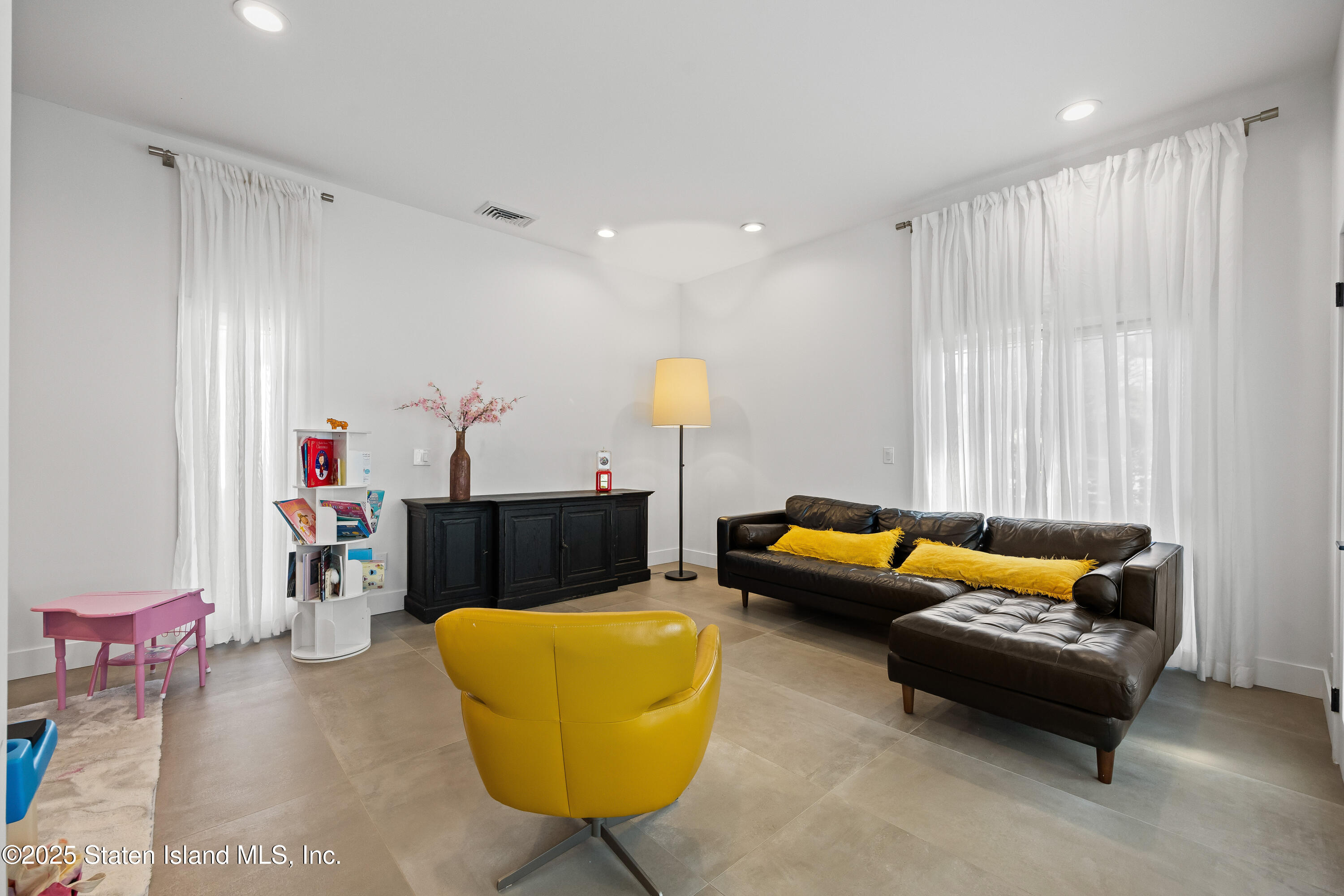 2 Wards Point Avenue Staten Island, NY 10307 - Photo 21 of 38 a living room with furniture and a table