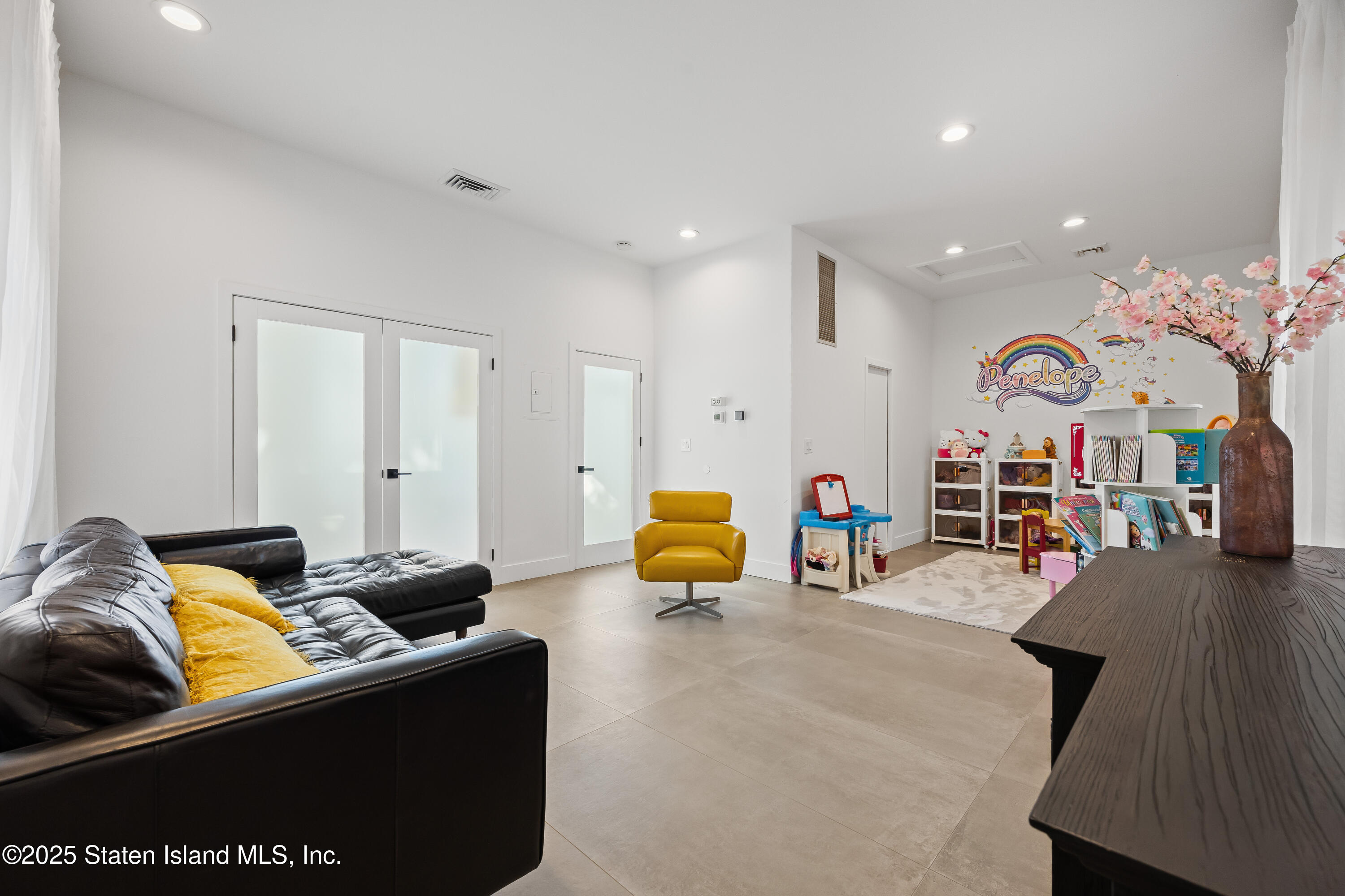 2 Wards Point Avenue Staten Island, NY 10307 - Photo 22 of 38 a living room with furniture and wooden floor