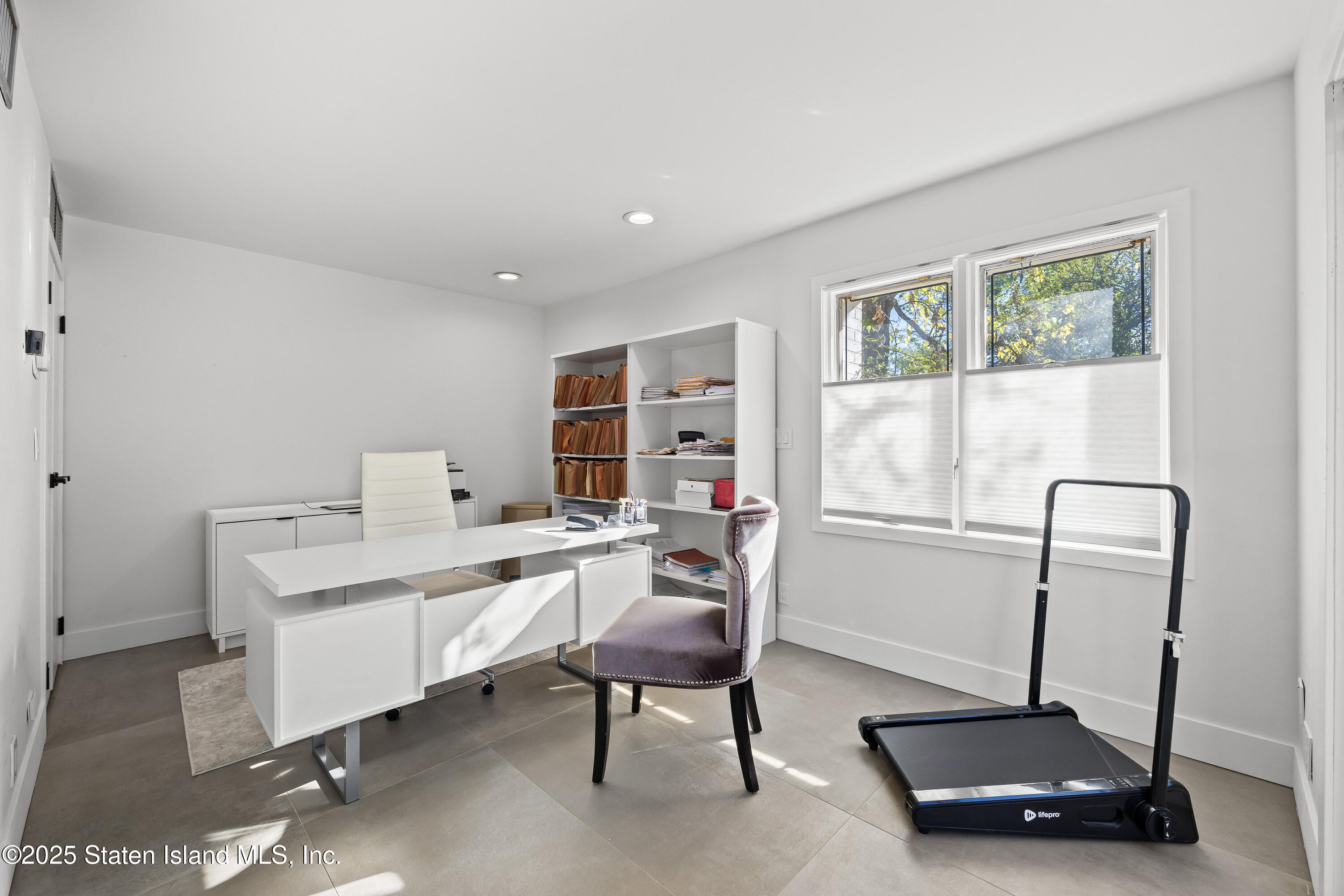 2 Wards Point Avenue Staten Island, NY 10307 - Photo 24 of 38 a room with gym equipment and a window