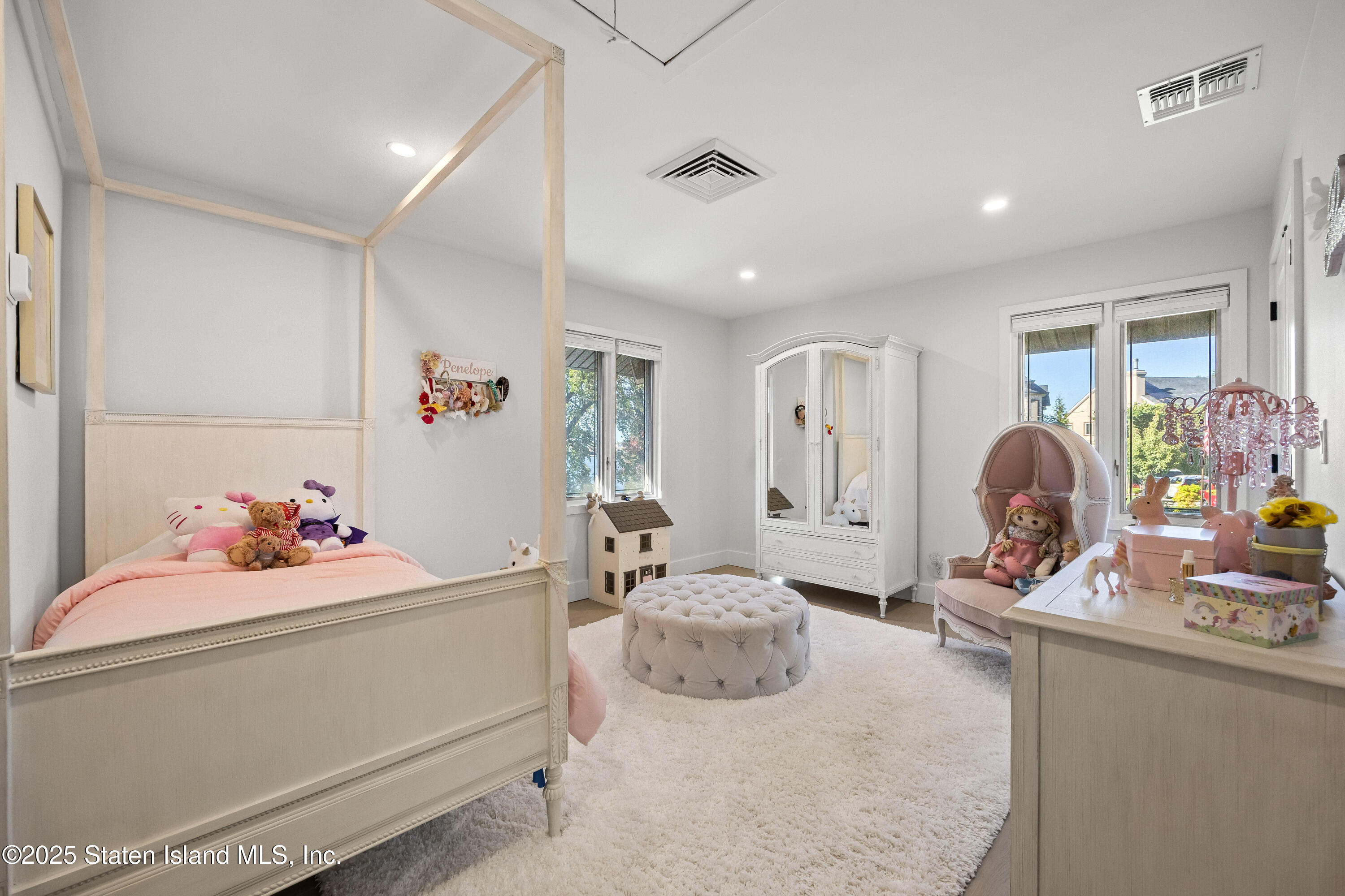 2 Wards Point Avenue Staten Island, NY 10307 - Photo 32 of 38 a bedroom with furniture and natural light