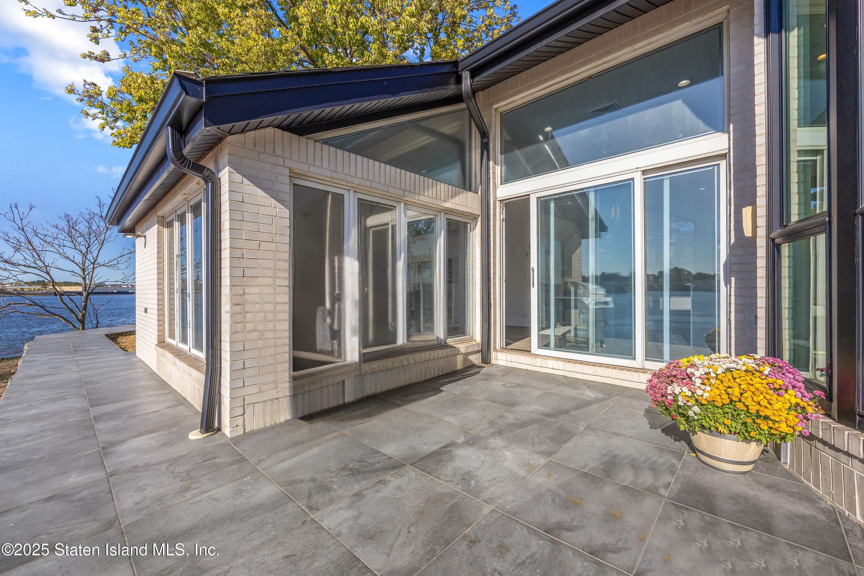 2 Wards Point Avenue Staten Island, NY 10307 - Photo 36 of 38 a view of a chair and table in the porch