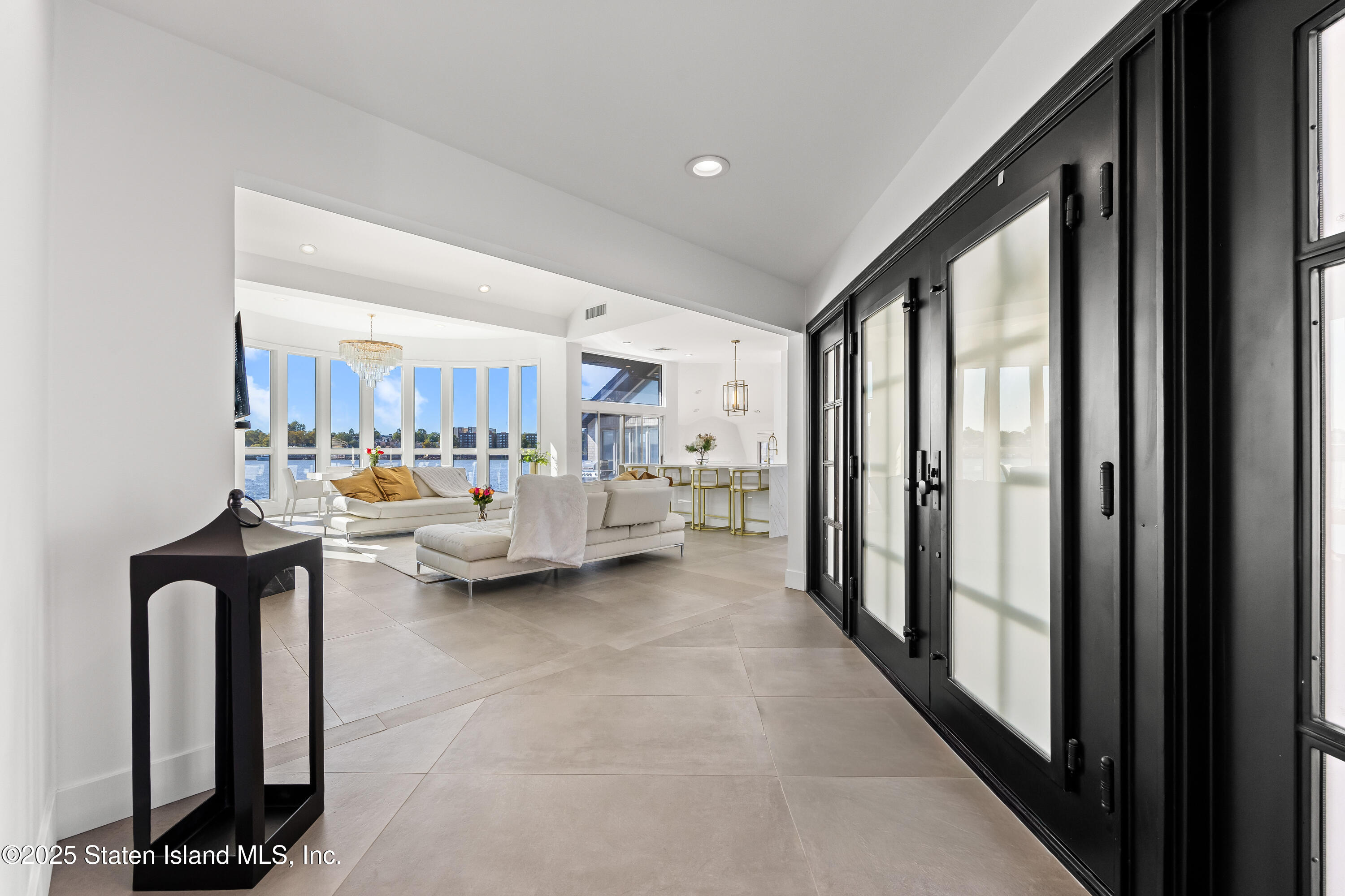 2 Wards Point Avenue Staten Island, NY 10307 - Photo 5 of 38 a living room with furniture and a floor to ceiling window